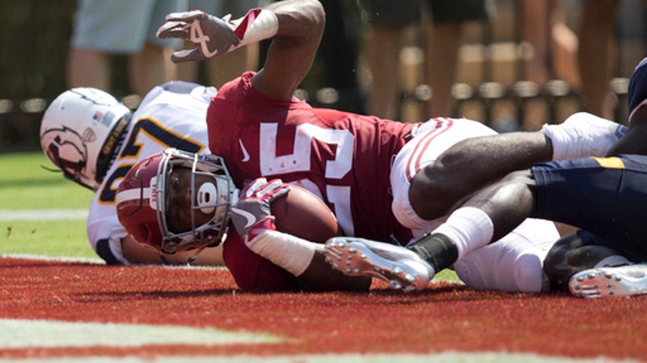 Bama running game rolling along with Harris, freshmen